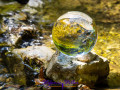 Lensball placed on stones within Falkenseebach