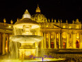 Petersdom at night with illuminated fountain